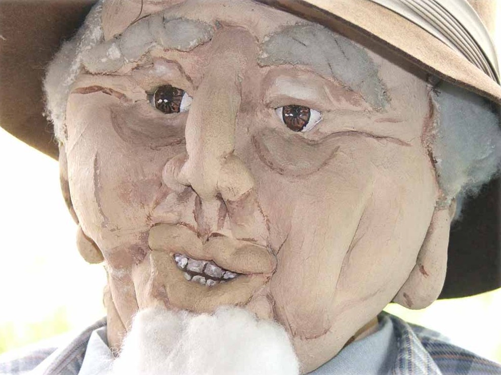 A friendly folk-art figure at Fred's Famous Peanuts in Helen, GA